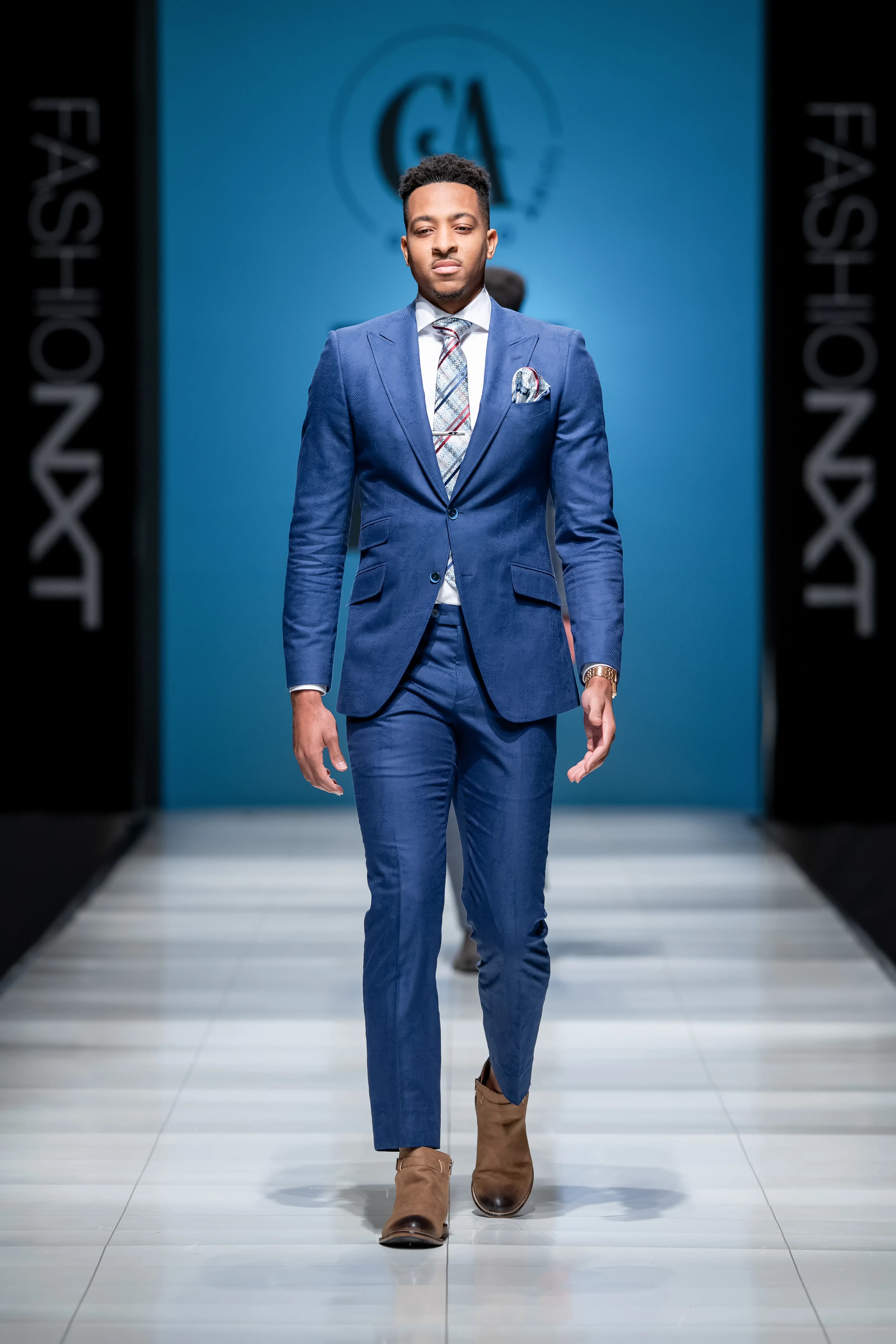 FashioNXT | Brand Partnerships & Experiential Production — CJ McCollum